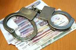 Получение взятки полицейскими Крымского района.